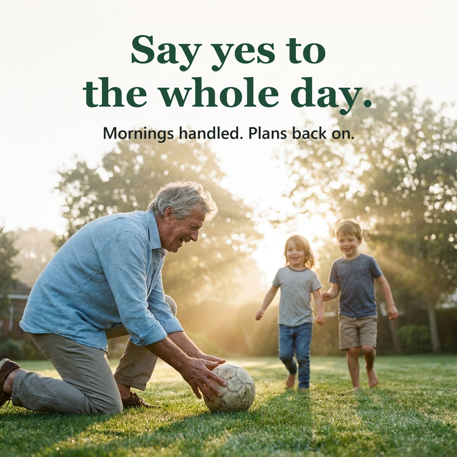 A grandfather playing ball with his grandchildren on a sunny lawn. Say yes to the whole day.